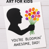 Child-made Father’s Day silhouette craft with colorful fingerprint flower bouquet and handwritten message